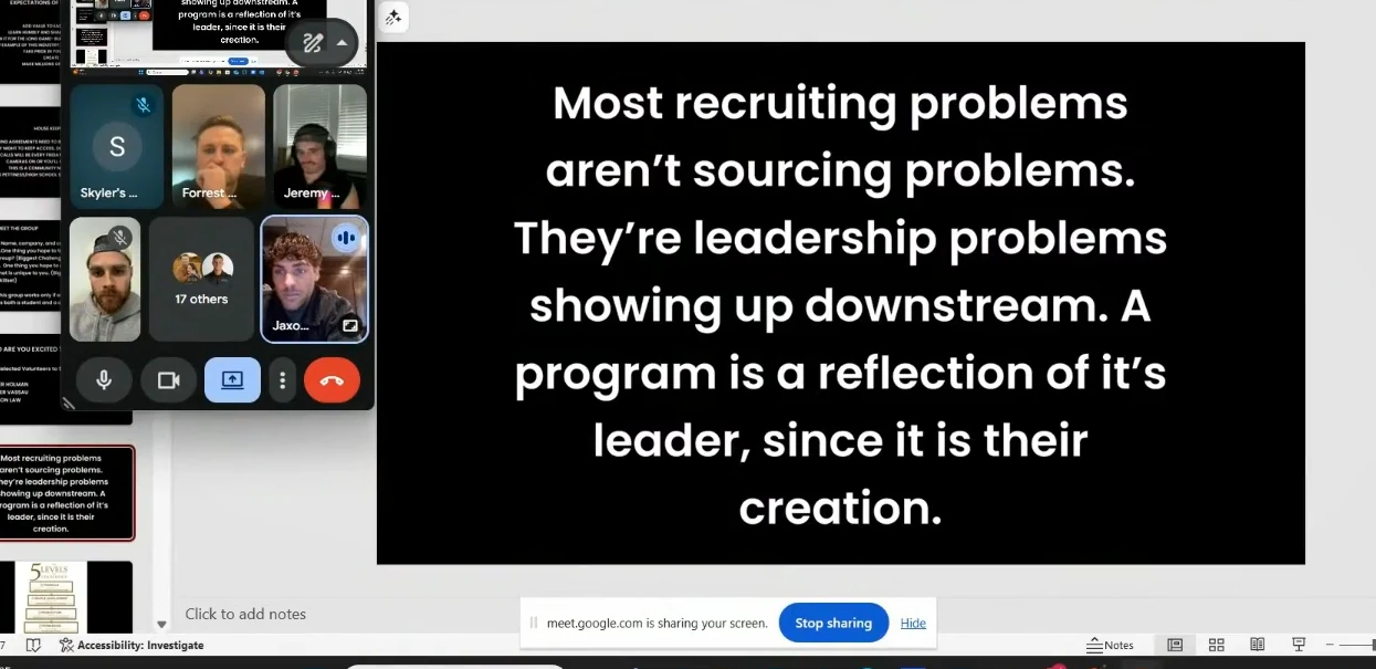 A live group coaching call in progress: a grid of participants beside a slide being shared